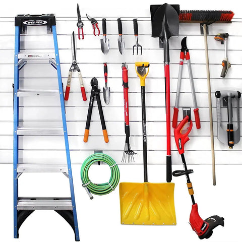 Garage setup with One Eighth Inch Steel Backplates Hook Kit For PVC Slatwall Panels; tools and ladder organized on slatwall.