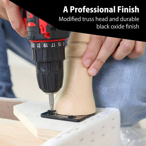 Heavy Duty Tough As Nails Black Oxide Modified Truss Head Wood Screws Set 100 Pack With Three Sizes being installed with a drill