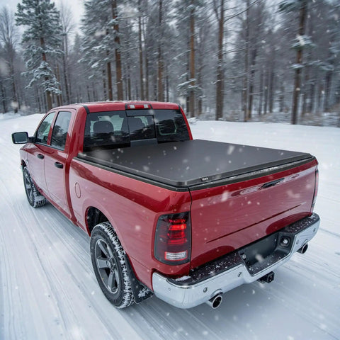 Soft Roll Up Truck Bed Tonneau Cover For 6 Ft 4 In Beds Built To Last Fits 2019 2024 Ram 1500 Classic, red truck in winter.
