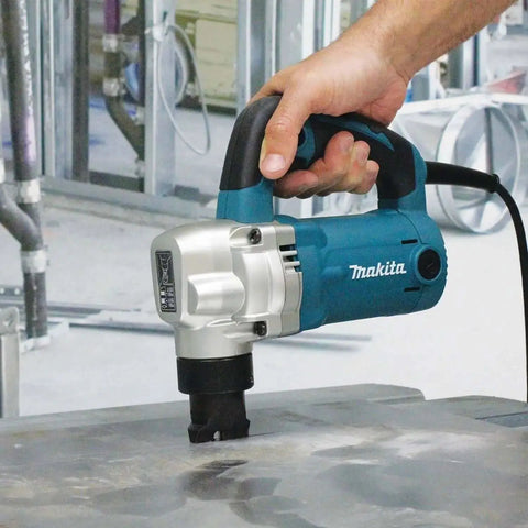 Person using Low Noise 10 Gauge Metal Nibbler with Lock On Trigger, lightweight 7.4 lb body, rubber grip handle for metal cutting
