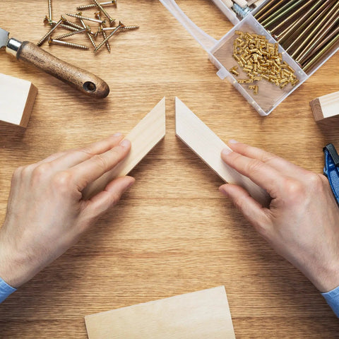 Hands holding wood pieces with 20Pcs Brass Hidden Barrel Hinges 5x25mm Concealed Hinges For Jewelry Boxes, Music Boxes, And Small Woodworking Projects