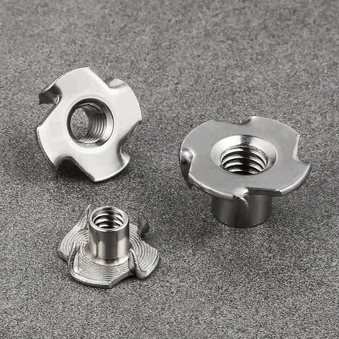 Close-up of 304 Stainless T Nut 100 Pack Four Jaw Quarter Inch 20 Thread For Home Outdoor with four-prong design