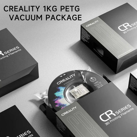 Creality 1kg PETG filament spool in vacuum packaging with boxes, labeled "CR Series 3D Printing Filaments"