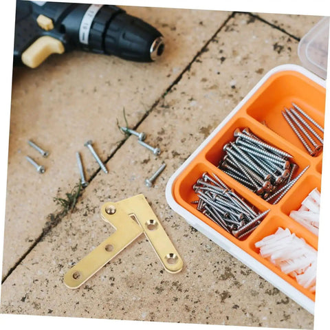Rotatable Copper Pivot Door Hinges Set For Hidden Doors And Cabinets, screws, drill, and organizer tray on a workbench