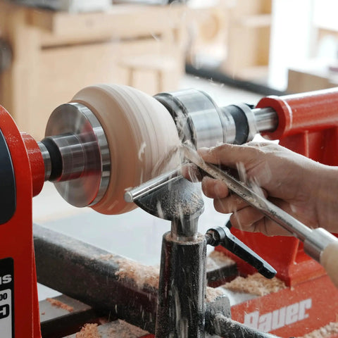 Woodturning Live Tailstock Chuck Adapter Converts Number Two Morse Taper Tailstock To 1 Inch By 8 TPI Thread With Included Morse Taper Arbor For Secure End Mount And Precise Centering in use on a lathe with a wood piece being turned