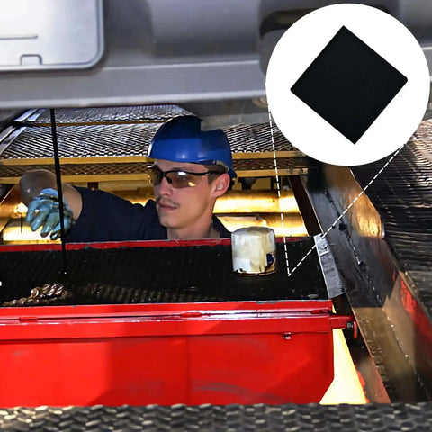 Mechanic using 22 Inch Square No Splatter Oil Change Pad For Cars under vehicle to prevent spills during oil change.