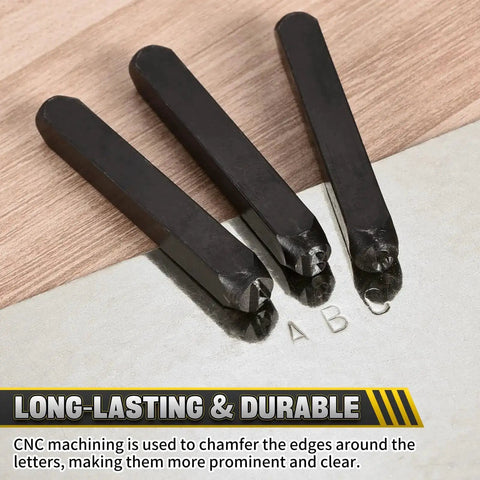 Close-up of 36-Piece Metal Stamping Kit for DIY Projects and Jewelry Making, showing letter imprints on a surface.