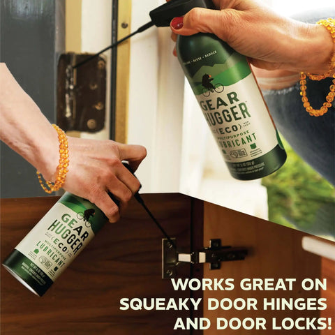 Hands applying All In One Multipurpose Lubricant Spray 11 Oz Pack Of 2 Eco Friendly Plant Based Formula No Petroleum No PTFE Rust Remover to door hinges
