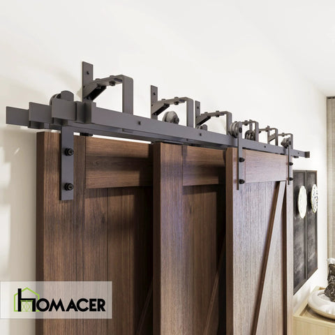 Black Rustic Triple Track Bypass Sliding Barn Door Hardware Kit for 1.375 to 1.75 inch doors installed, showing tracks and rollers.