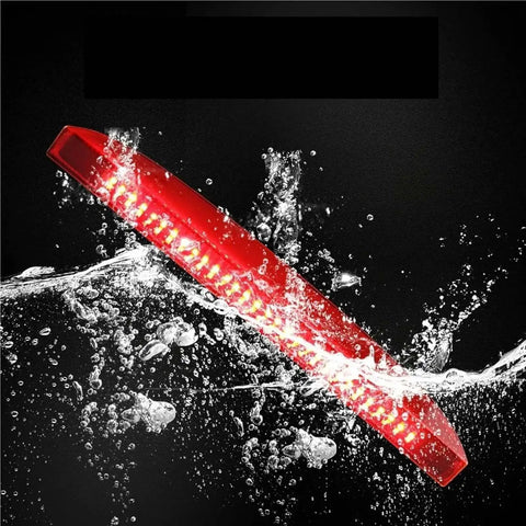 Waterproof plug and play high mount third brake light stop lamp for Renault Clio Mk III/II with LED smoke lens, illuminated in water.
