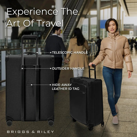 Person holding black Large 29 Inch Expandable Spinner Checked Luggage For Travel With One Touch CX Compression And Four 360 Spinner Wheels