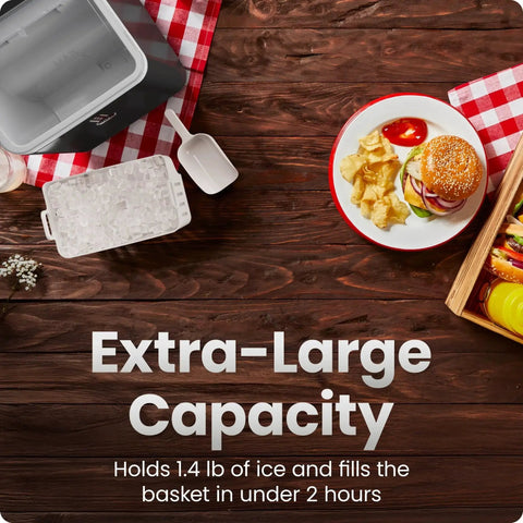 Countertop nugget ice maker with removable ice basket and scoop on a wooden table; beside a burger and chips plate.