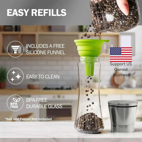 Stainless Steel Salt And Pepper Grinder Set Of 2 With Adjustable Ceramic Mills, filled with peppercorns using a green funnel.