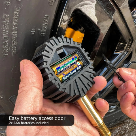 JACO ElitePro digital tire pressure gauge with rugged black housing, open battery door showing 2 AAA batteries.