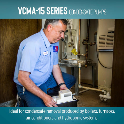 Little Giant VCMA-15UL condensate pump in a boiler room; HVAC technician kneeling beside the white 115V unit.
