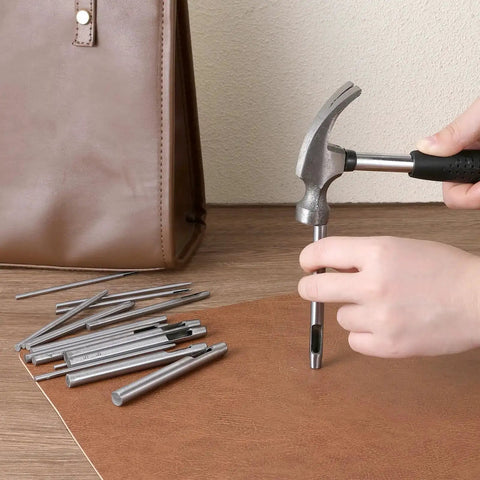 Person using Pro Grade Beefy Leather Hole Punch Set with 0.5 to 7mm hollow punches on leather surface