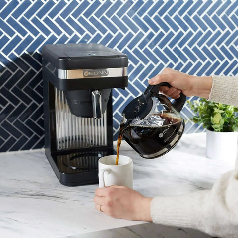 Speed Brew Elite 10 Cup Coffee Maker With Internal Stainless Steel 70 Oz Hot Water Tank Quick Brew Technology shown in use on counter