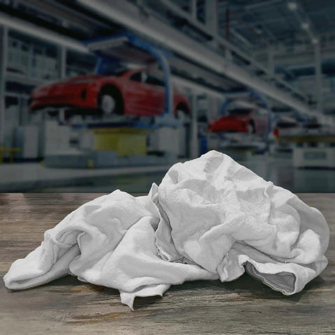 Recycled White Fleece Rags 50 lb box for cleaning and polishing auto home and workshop low lint mad absorbent wipes on table
