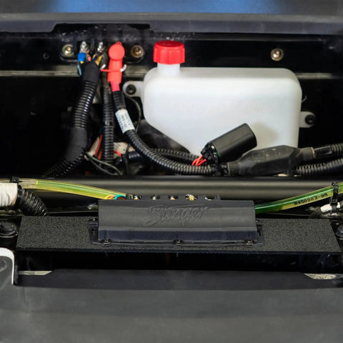 4 Channel 100 Amp Solid State Relay Block installed in marine vehicle with visible wiring and components