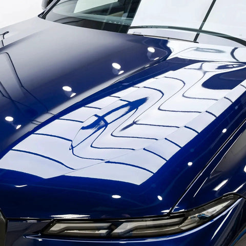 Shiny car hood demonstrating Gyeon Mohs Ceramic Coating Kit For Cars DIY Deep Gloss And 3 Year Protection application effect