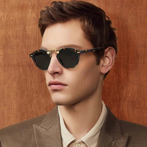 Man wearing Double Bridge Round Polarized Sunglasses For Men With UV Protection Retro Tortoise Eyewear Nickel Free Metal Brow Design Classic Dope Sunnies For Everyday Wear And All Day Comfort.