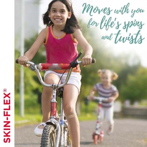 Girl riding bike wearing Skin-Flex Adhesive Bandages With MotionMax Technology For Flexible, Skin-Like Fit And Lasting Comfort