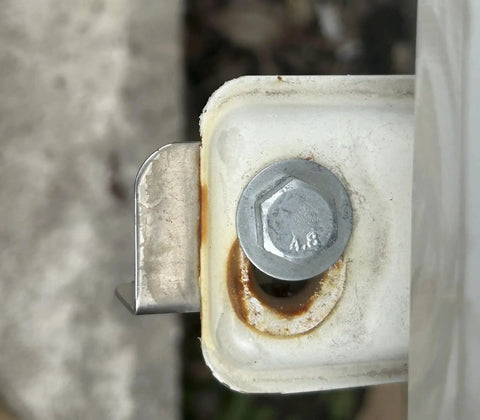 Beefy 304 Stainless Steel 3/8-16 Hex Bolt in use, installed in metal bracket, showcasing corrosion resistance and heavy-duty capabilities