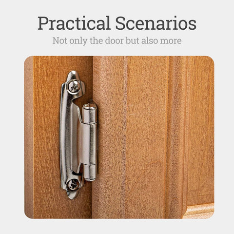 Steel cabinet hinge mounted on a wooden cabinet door with a silver finish.