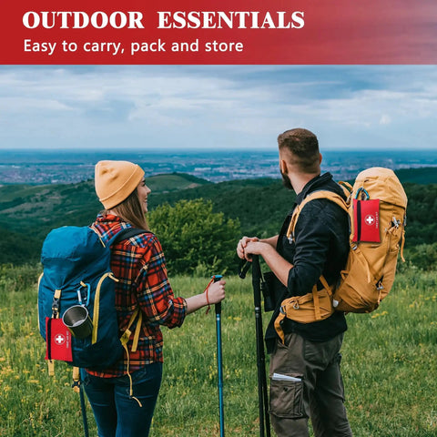 Two hikers with backpacks featuring Ultra Portable 140 Piece First Aid Kit Designed For Car Home Office Travel Camping Sports Outdoor And School