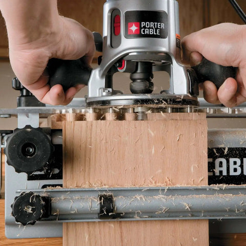 Close-up of Deluxe 12 Inch Dovetail Jig For Woodworking And Cabinet Making Pro Grade Router Jig Kit in use with wood.