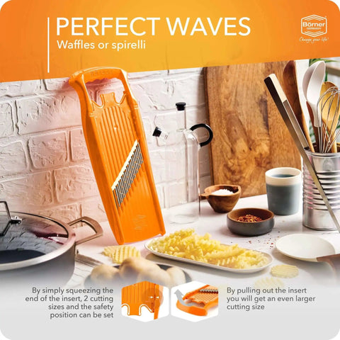 Wave Waffle PowerLine Veggie Slicer for Crinkle Cut, Waffle and Spirelli Styles with Adjustable Thickness, orange on kitchen counter.