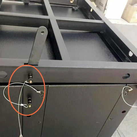 Installed Stainless Steel T Handle Quick Release Pin with Lanyard Cable, Push Button Safety Lock Pin in an industrial setup.