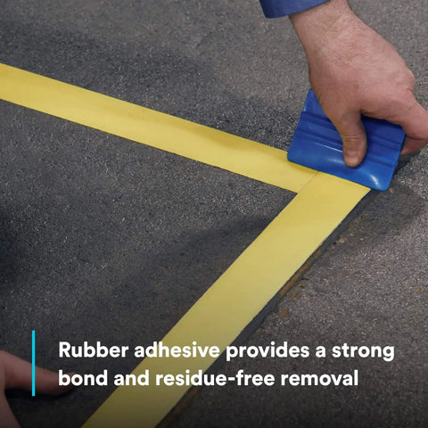 Applying Durable Floor Marking Tape 971 Single Roll Yellow 4 in x 36 yd (102 mm x 32.9 m) on concrete flooring