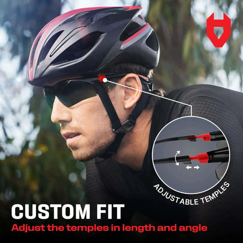 Cyclist wearing green tinted wraparound safety glasses with adjustable arms and no slip grips, UV 400 protection, ANSI Z87.1 rated.