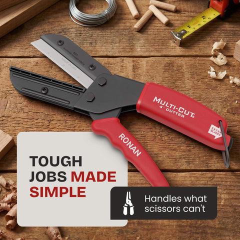 Multi-Cut 401 heavy-duty utility cutter for wood, plastic, rope, leather, linoleum, rubber, PEX piping, with red handle on table