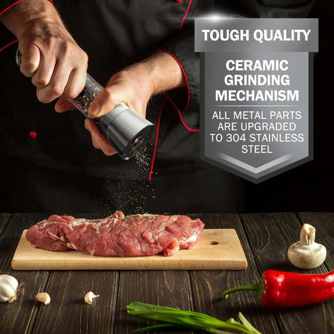 Stainless Steel Salt And Pepper Grinder Set Of 2 With Adjustable Ceramic Mills used on steak, emphasizing ceramic grinding mechanism
