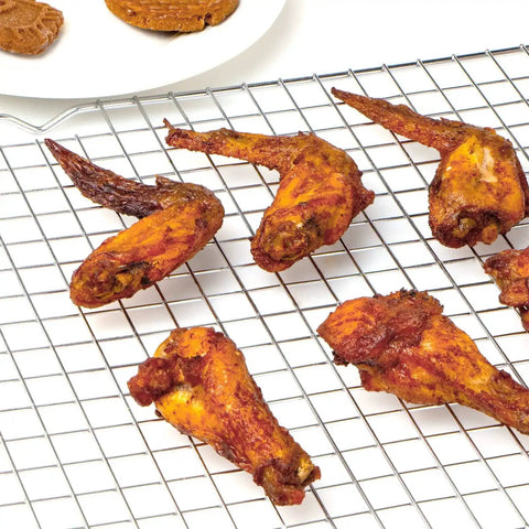 Chicken wings on a Two Pack Stainless Steel Cooling Rack For Baking 16x10 Inches, Oven Safe Thick Wire Cookie Rack, Silver