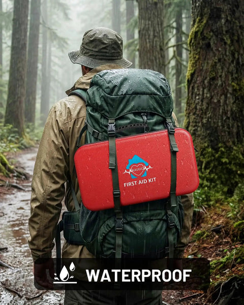 Hiker with waterproof 500 Piece First Aid Kit for Home, Car, Travel, Camping and Office, mounted on backpack in forest