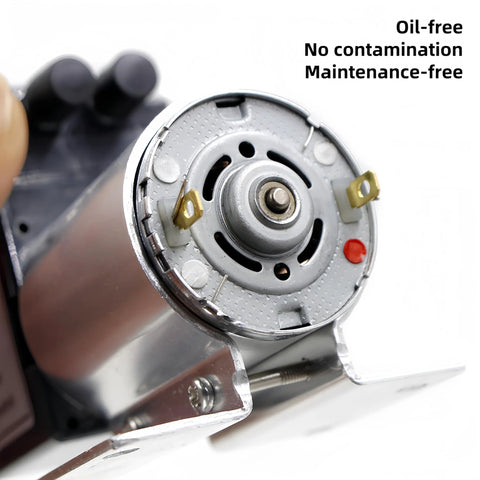 DC 12V vacuum pump end cap with metal housing, shaft and mounting bracket, side view