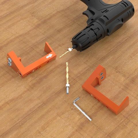 Undermount Drawer Drilling Guide Pro Kit with aluminum drill angle guide, steel inserts, drill bits, and parts on wooden surface.
