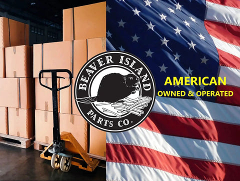 Warehouse with stacked boxes, hand pallet truck, Beaver Island Parts Co. logo, American flag, text 'American Owned & Operated'