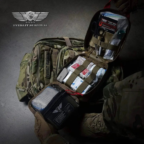 Advanced Outdoor Trauma Kit With CAT Gen 7 Tourniquet Mil Spec Nylon Pouch And 36 Inch Splint For Bleeding Control open on floor