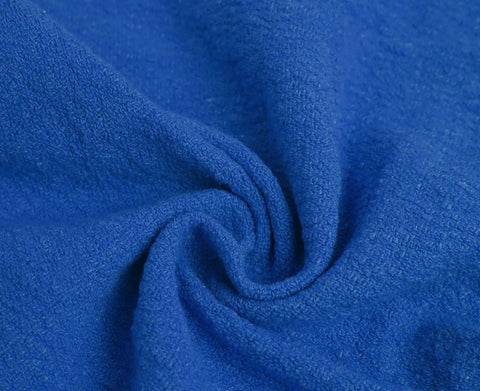 Close-up of blue Ultra Absorbent Cotton Shop Towels Pack Of 50 12 By 14 Inches Super Soft Rags For Home Garage And Auto Care.