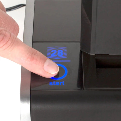 Close-up of finger pressing touch screen control on Electric Three Hole Punch For 28 Sheet Capacity With Auto Jam Reverse and platinum finish.