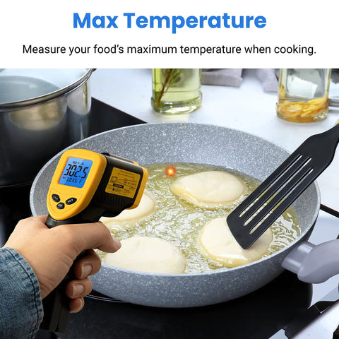 Close-up of Lasergrip 1080 Infrared Thermometer For Kitchen Cooking Grilling And BBQ Bath Water Digital Temperature Gun Non Contact IR Thermometer -58F To 1130F Yellow And Black Etekcity measuring temperature in a frying pan.