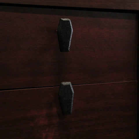 Gothic Black Cast Iron Coffin Drawer Pulls, 6-Piece Set, installed on dark wooden drawers, each 2.5 inches long and 1.5 inches high.