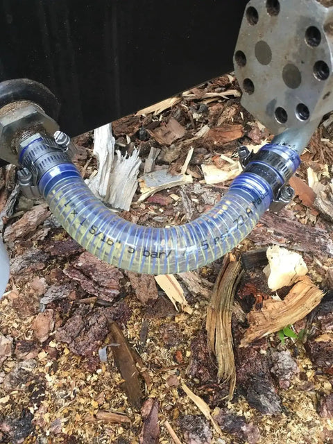 Clear PVC Spiral Steel Reinforced Flexible Hose 1.5 Inch ID, 5 Feet Long, connected for water drainage task.