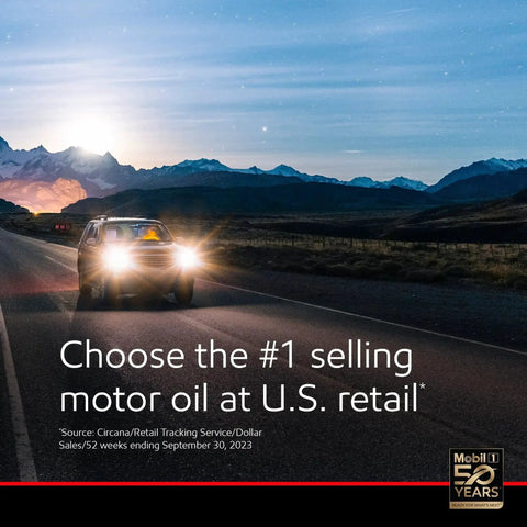 Car driving on a mountain road at sunset with text promoting Mobil 1 as the top-selling motor oil in U.S. retail