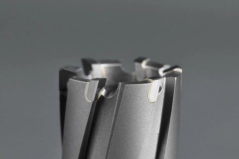 Close-up of Carbide Annular Cutter Set For Drill Press By JESTUOUS showing cutting edges and tips, gray metal finish, Weldon shank style.