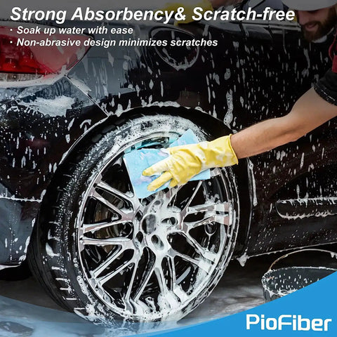 Person washing car tire with microfiber towel, showcasing Edgeless Microfiber Towels 20 Pack For Car Detailing And Home Cleaning 12 By 12 Inch No Fuss Reusable Lint Free Streak Free Glass And Stainless Steel Kitchen And Garage Rags.